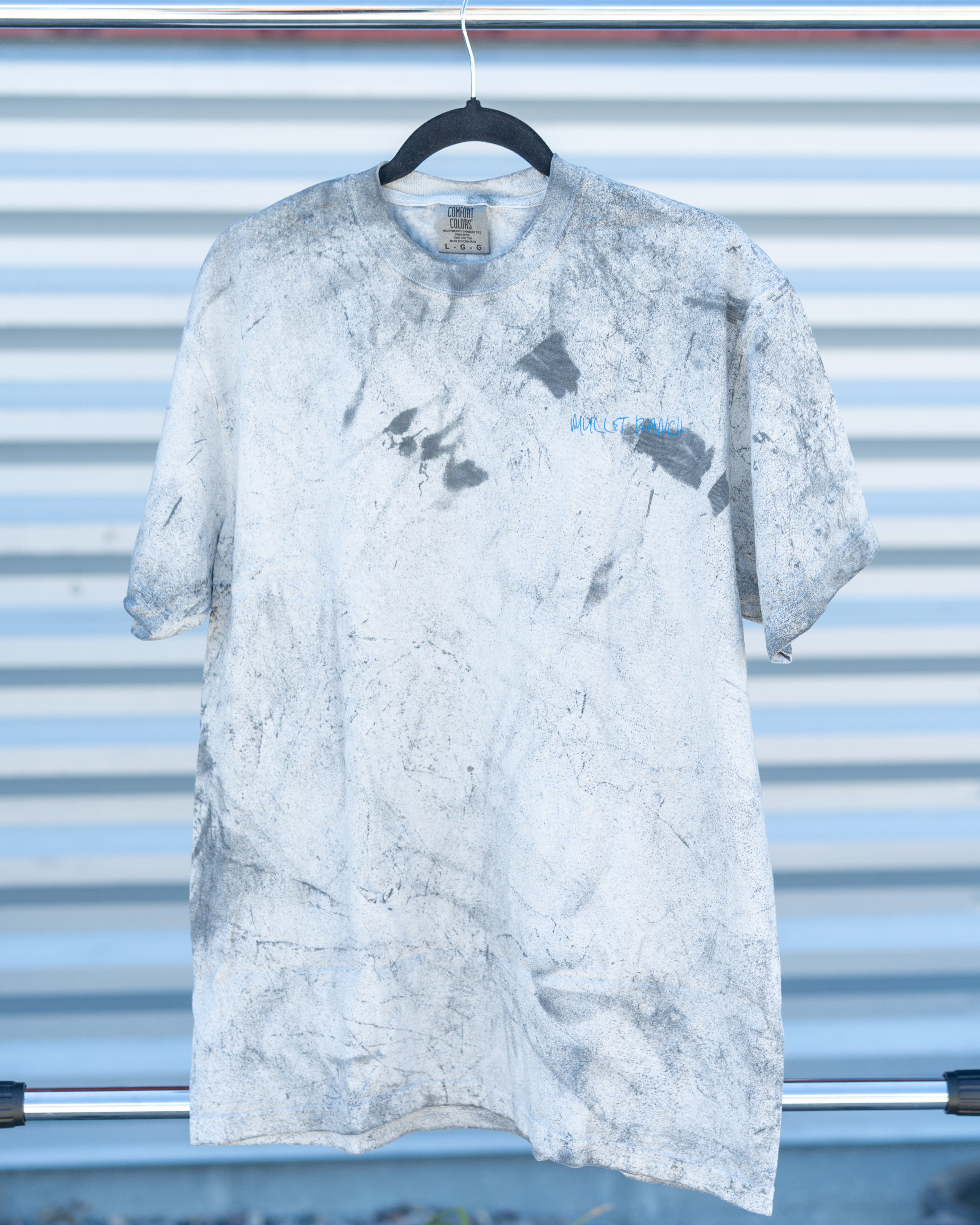 Raised in the dirt tie-dye t-shirt